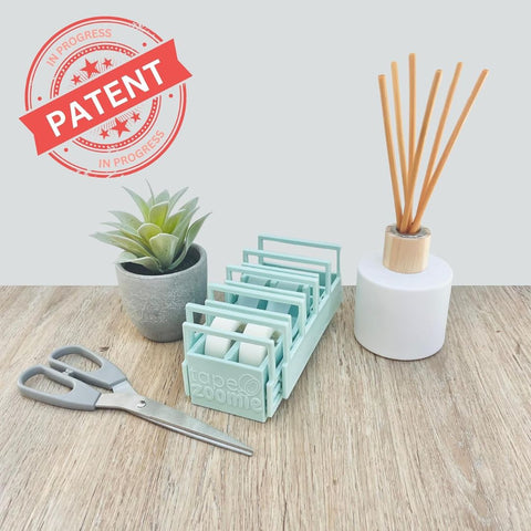 DISPENSADOR PLEGABLE DE CINTA ADHESIVA TRANSFRONTERIZA - L0166